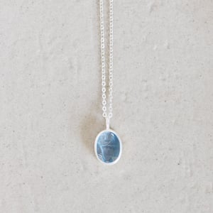 Image of Aqua Blue Kyanite crystal form oval shape mixed cut silver necklace no.2