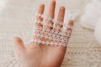 Image 2 of Dainty flower tieback with elastic back 
