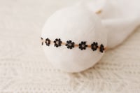 Black Flower tieback with elastic back 