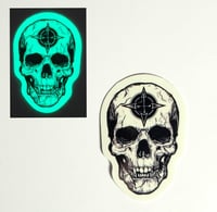 Image 1 of Glow In The Dark Skull With 4 Directions Symbol On Forehead Glossy Finish Vinyl Sticker