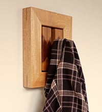 Image 2 of Wood wall hook with decorative frame.