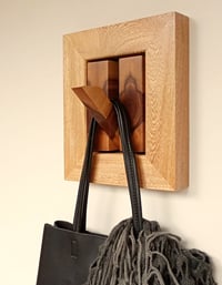 Image 5 of Wood wall hook with decorative frame.