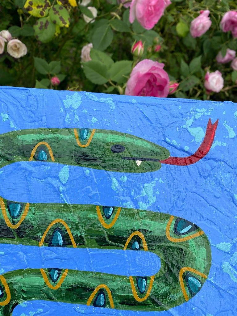 JUST ANOTHER SNAKE IN THE GRASS Image 2