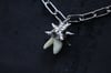 Dead good spikey tooth amulet 