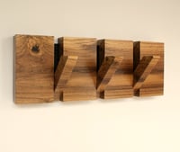 Image 1 of Wood coat rack, 3 hooks.