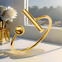 Image 1 of Gold Ball and Bar Ring