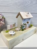 Rambling Rosebud cottage