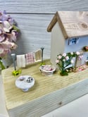 Rambling Rosebud cottage