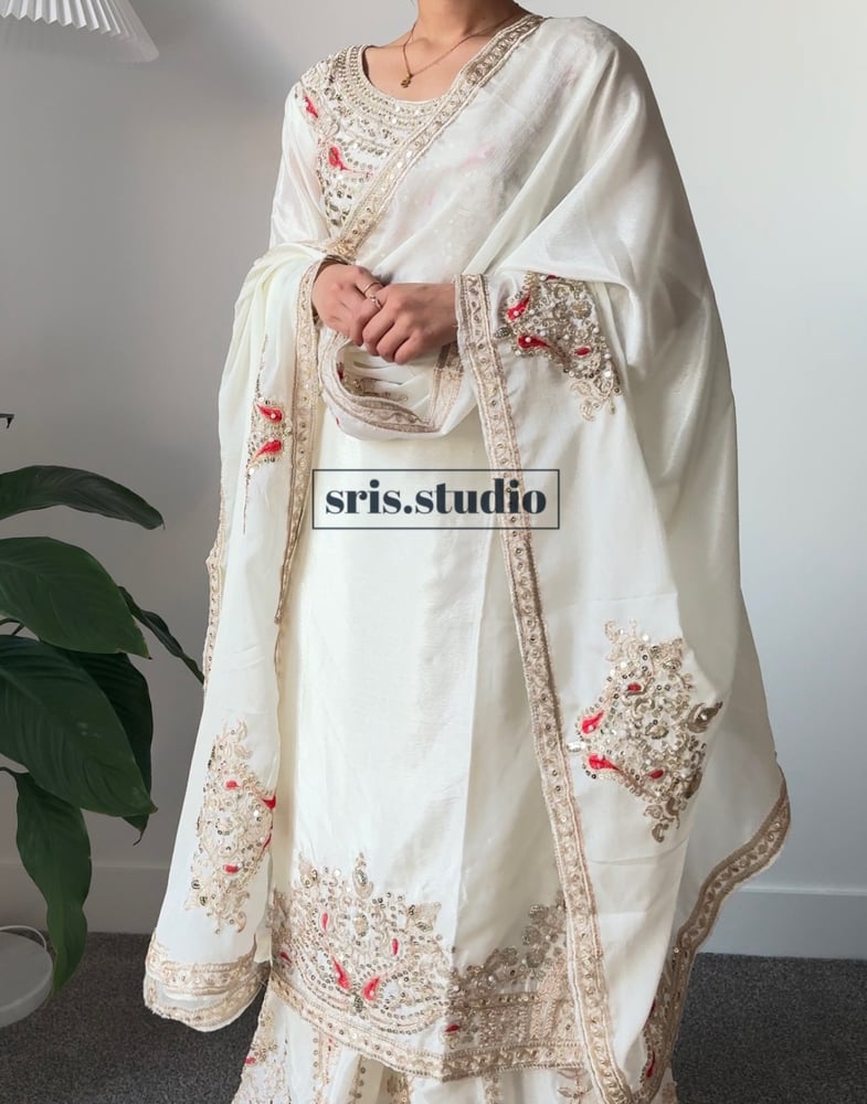 Image of Cream three piece kurtha set