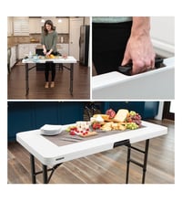 Image 6 of Kids  plastic table 4ft long  , folding legs  , adjustable  height 