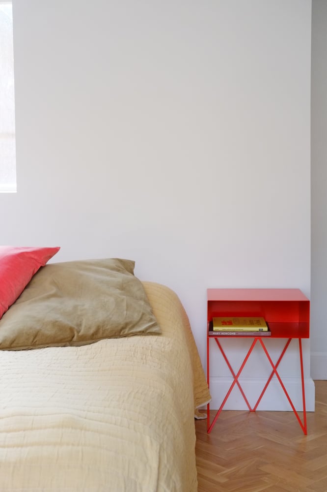 Image of Slight second red Robot side table