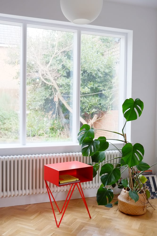Image of Slight second red Robot side table