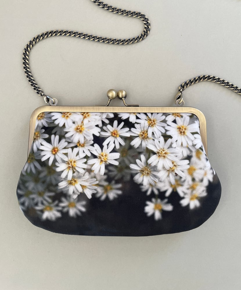 Image of Daisy flowers, printed velvet kisslock bag with crossbody canvas or chain strap