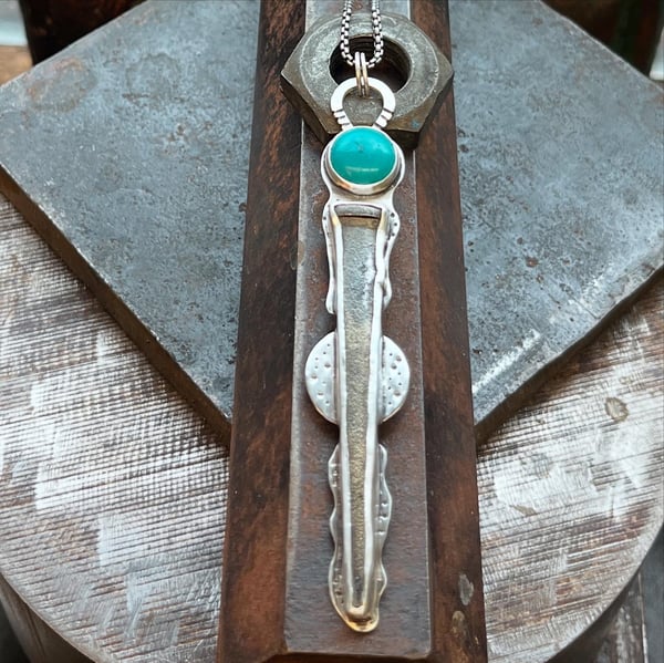 Image of Nail and Turquoise Pendant