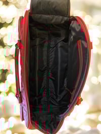 Image 3 of Quilted Vegan Leather Rolling Duffel (red or black) 