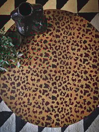 Image 3 of Black Leopard Table. 