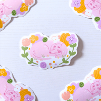 Image 1 of Sleeping Pup in a Flower Bed Sticker