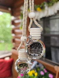 Image 1 of Car jar diffuser in carribean breezes $7.00