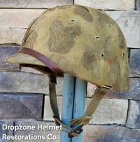 Image 1 of WWII USMC M1 Helmet & Firestone-Inland Liner. Fixed bale type. Marine Camo cover.