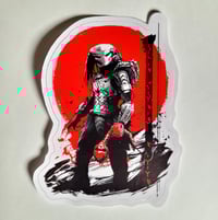 Image 1 of Predator Holding A Bloody Spine Hunter's Moon Matte Vinyl Sticker