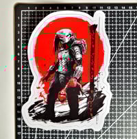 Image 2 of Predator Holding A Bloody Spine Hunter's Moon Matte Vinyl Sticker