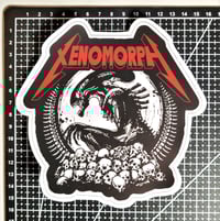 Image 2 of Xenomorph Aliens With Metallica Font Matte Vinyl Sticker