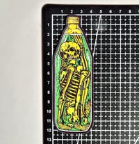 Image 2 of Skeleton In A Bottle Glossy Finish Vinyl sticker