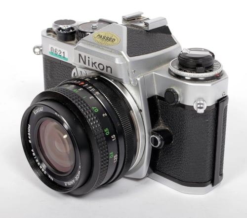 Image of Nikon FE 35mm SLR film camera with 28mm F2.8 lens #0621