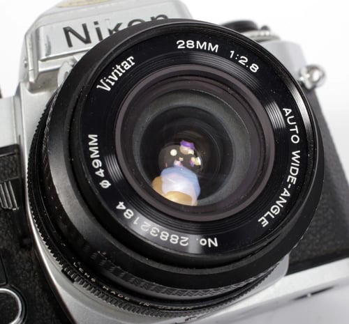 Image of Nikon FE 35mm SLR film camera with 28mm F2.8 lens #0621