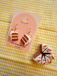 Image 1 of carrot cake dangle earrings