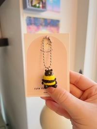 Image 2 of yellow black bee charm