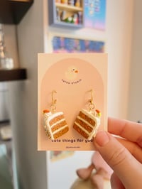Image 2 of carrot cake dangle earrings