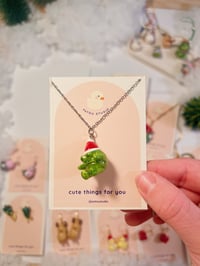 Image 3 of miniature necklace | christmas wreath, snowman, and santa frog