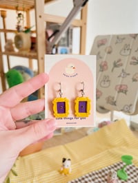 Image 1 of friends' yellow door frame dangle earrings