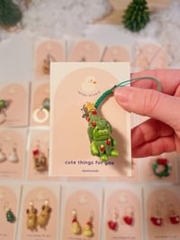Image 4 of christmas miniature phone charm | peanuts, frog, penguin, snowman, tree