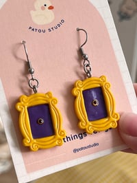 Image 2 of friends' yellow door frame dangle earrings