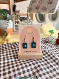 Image 3 of star and moon stamp dangle earrings