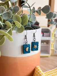 Image 4 of star and moon stamp dangle earrings