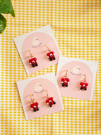 Image 2 of bad bunny hearts dangle earrings