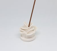 Image 1 of white flower incense holder