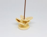 Image 2 of yellow flower incense holder