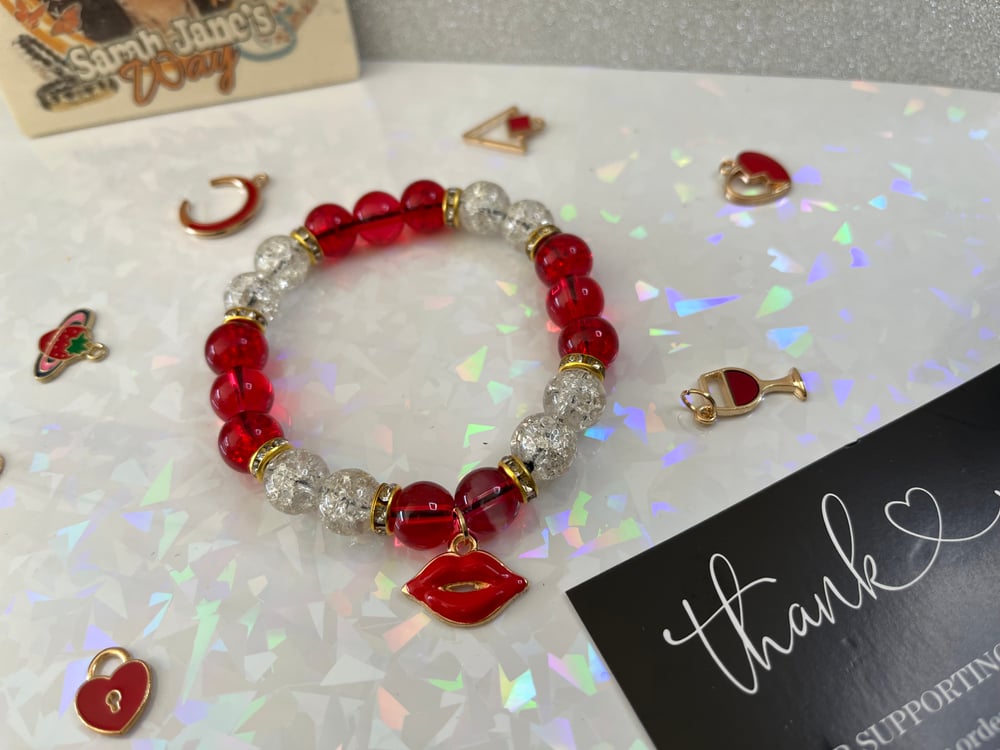 Image of Kiss charm