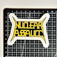 Image 2 of Nuclear Assault Yellow Band Logo Matte Vinyl Sticker