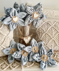 Image 1 of Memory Flowers custom created from a stunning ladies lace top & skirt