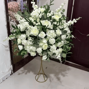 Image of White  and green  silk flowers  centerpiece