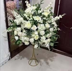 Image of White  and green  silk flowers  centerpiece