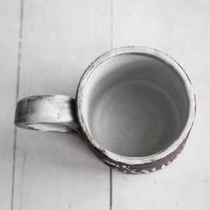 Image of Small Rustic Brown Raw Stoneware Coffee Cup with Hand Carved Flowers, Made in USA