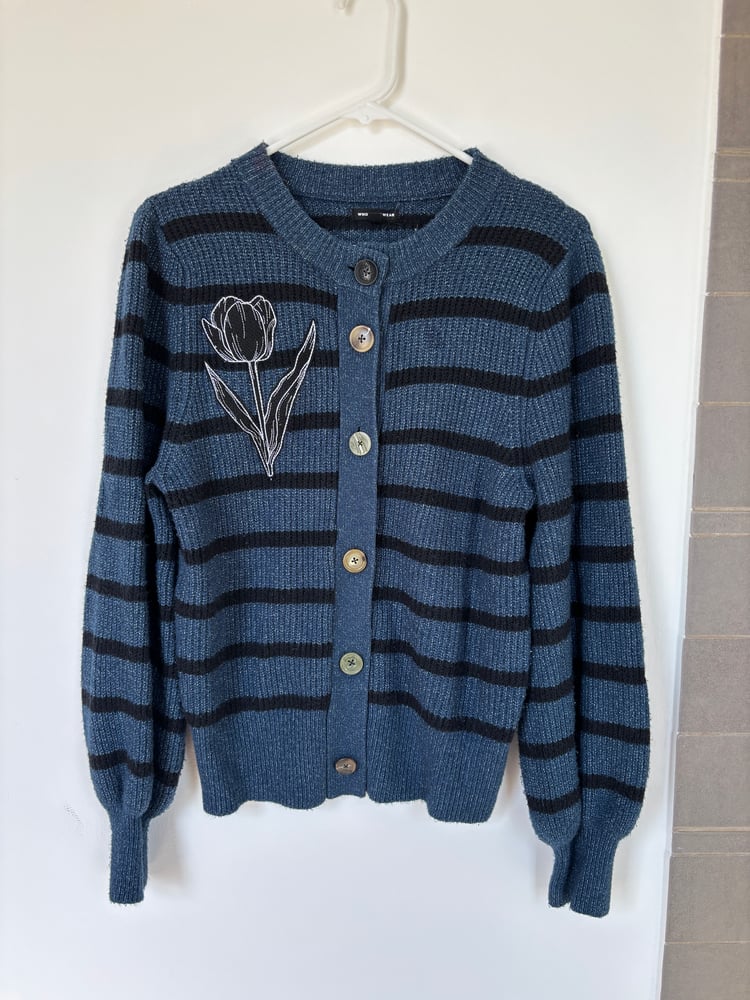 Image of Upcycled Tulip Patch Cardigan – Striped Blue Knit Sweater with Colorful Buttons, One of a Kind