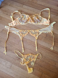 Image 2 of yellow bra and panty and garter belt
