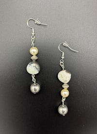 Asymmetrical Silver Stones